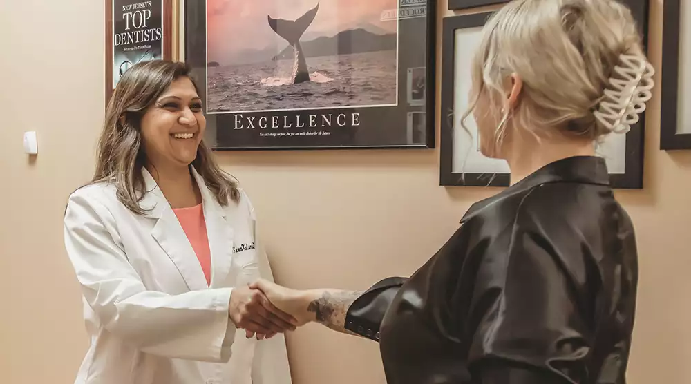 Dr. Kalaria Greeting a New Dental Patient